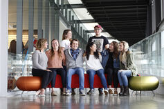 A group of smiling IU Columbus students sits together.